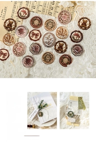 Detailed relief embossed stickers with vintage faux wax seal designs for gift wrapping