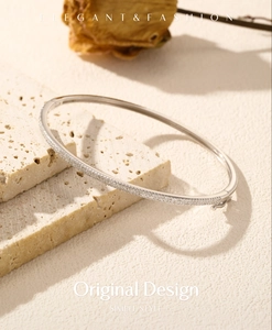 Detailed macro view of elegant S925 silver bracelet featuring micro-pave diamond setting