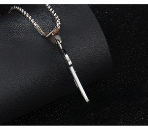 Detail shot showing the 2.1mm thickness of the stainless steel letter pendant necklace