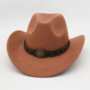 Detail of tan felt cowboy hat with a braided band and bronze star metal emblem