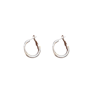 Minimalist silver hoop earrings with polished finish and hinged closure on white background