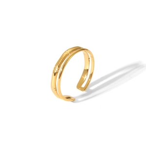 Detailed view of the double-layered golden bamboo design on an adjustable open metal ring