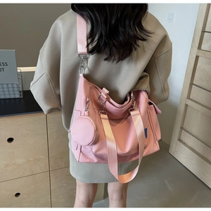 Pink Oxford cloth tote bag with matching wide strap and a round coin purse charm