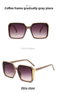 Detail of square coffee frame sunglasses with gold hollow metal decor and gradient lenses