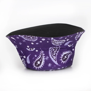 Detailed view of purple paisley bucket hat featuring reinforced stitching and black inner lining