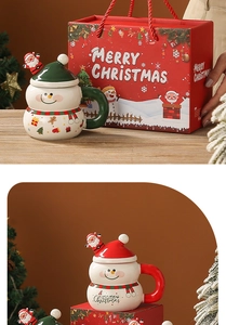 Christmas ceramic mug set with snowman design, lid, spoon and matching red gift bag