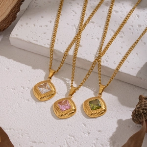 Vintage gold square necklace with zircons in pink, white, and green on stone base