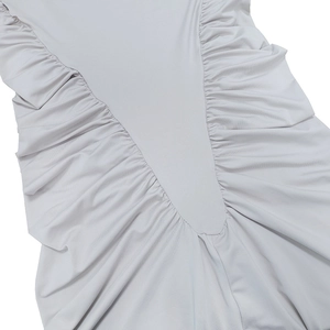 Detailed view of light gray ruching texture and back seam on the high neck slim dress
