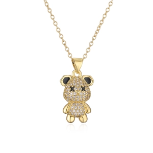 Gold plated bear pendant necklace with sparkling cubic zirconia and black X eyes