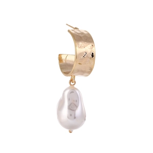 French vintage baroque pearl earrings with golden U-shaped textured hoop on white background