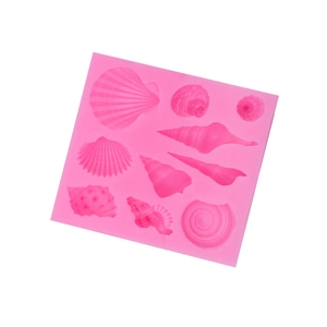 Stampo in silicone rosa con varie conchiglie e stelle marine per fondente e cioccolato