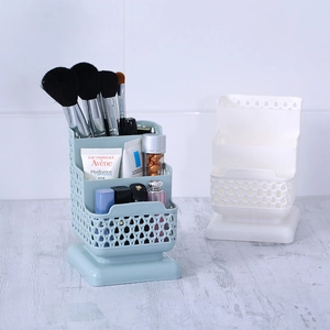 Blue minimalist square plastic desk organizer with a woven texture and multi-compartment design