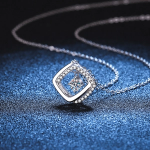 Geometric square silver necklace with a 30-point D color moissanite dancing pendant