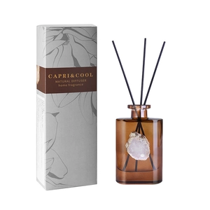 Brown glass home fragrance diffuser set with natural agate stone and fiber reeds
