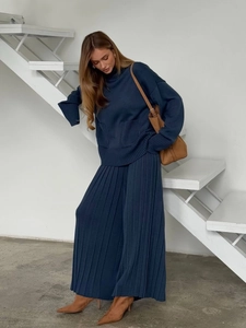 Women's navy blue turtleneck knit sweater and pleated wide-leg pants two-piece set