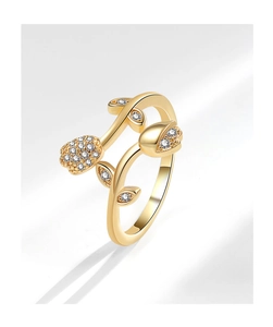 Close-up of gold-plated tulip ring with sparkling zircon stones and leaf detail