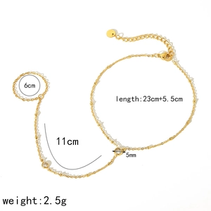 Luxury gold titanium steel anklet with cubic zirconia crystals and toe ring attachment