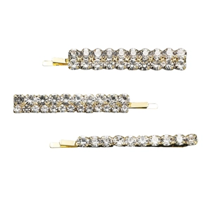 Close-up of three gold metal hairpins with clear rhinestones in single and double rows
