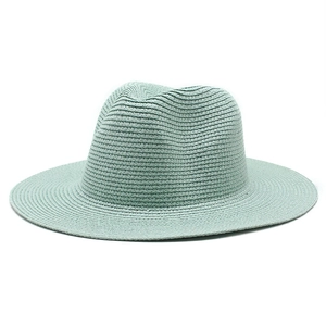 Breathable mint green straw panama hat with woven texture for summer sun protection