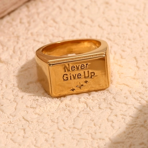 18K gold plated stainless steel signet ring with Never Give Up engraving and star detail