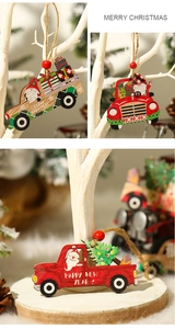 Close-up of hand-painted wooden Christmas tree car ornaments with red beads and twine
