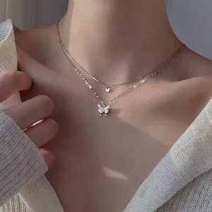 Double-layered butterfly pendant necklace with shimmering crystals for a luxury look