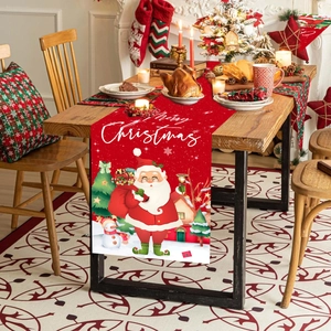 Christmas table runner with Santa Claus pattern on a festive dining table decoration