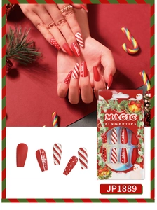 Detail showing Christmas red and white press on nails with snowflake and candy patterns