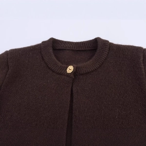 Fashionable dark brown round neck knit cardigan with textured golden button detail