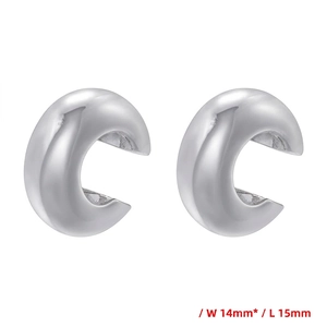 Macro detail of chunky silver C-shape earrings with precise 14mm by 15mm dimensions