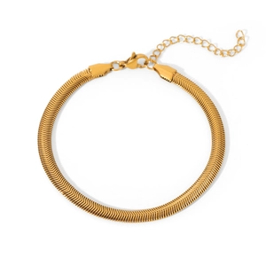 Detail of golden stainless steel flat snake chain bracelet with adjustable extender link