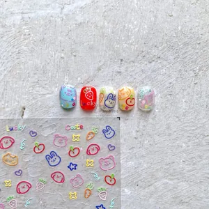 Detail of 5D embossed nail stickers featuring cute cartoon bears, rabbits and fruits