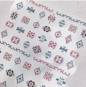 Detailed view of 5D embossed nail stickers featuring vintage geometric Persian patterns