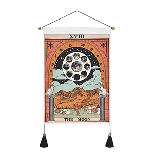 Bohemian tarot moon wall tapestry with decorative black tassels on white background
