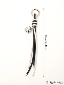 Detail of woven leather keychain with silver heart pendant showing 19cm length and weight