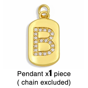 Hip hop style gold letter B pendant with sparkling crystals on white background