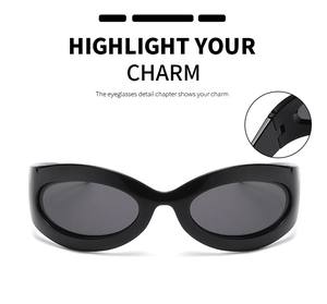 Detailed macro view of wide hinge and glossy black frame on oval Y2K sunglasses