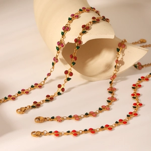 18K gold stainless steel bracelet with red cherry pendants and lobster clasp