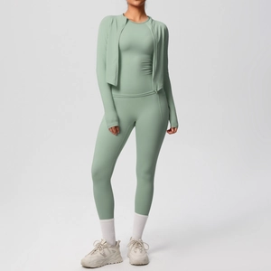 Three-piece yoga set in sage green featuring slim-fit zip jacket and high-waist leggings
