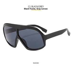 Side view of oversized flat lens sunglasses in black frame with grey lenses