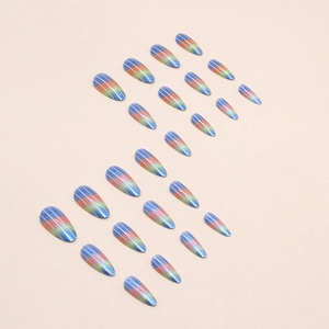 Rainbow almond press-on nails with metallic blue base and fine silver line accents