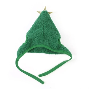 Detail view of a green plush Christmas tree pet hat with a gold star and tie straps