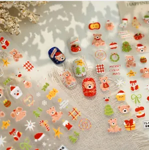 3D relief Christmas nail stickers featuring cute bears and festive holiday patterns