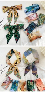 Detailed texture of artistic silk scarf with famous oil painting prints and elegant finish