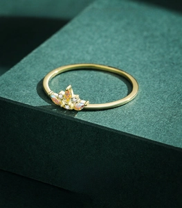 Detail of s925 silver crown ring with marquise opals and zircons on green stand
