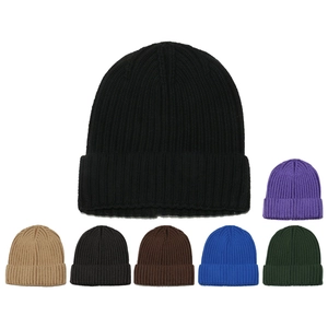 Detail of ribbed knit beanies showing black, purple, khaki, and navy color options