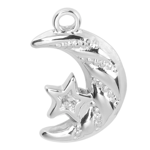Detailed macro view of silver moon and star pendant with beads and faceted gemstone