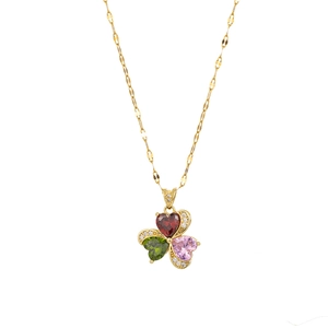 Luxury gold clover necklace set with pink, green and red gemstones and micro-pave zirconia