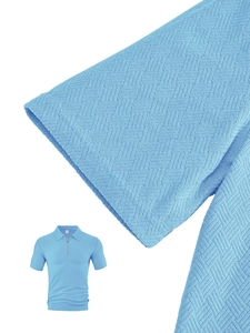 Detailed macro view of the sky blue polo shirt showing the unique textured knit fabric and zipper