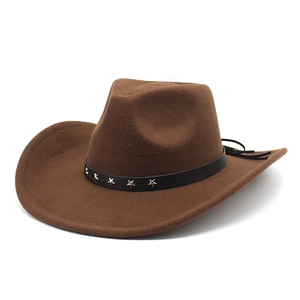 Detailed view of brown wool felt jazz hat featuring black faux leather band with silver stars